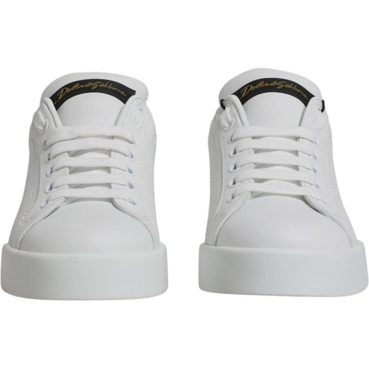 Dolce & Gabbana white leather low top sneakers with rubber soles, lace-up closure, and logo details, crafted in Italy.