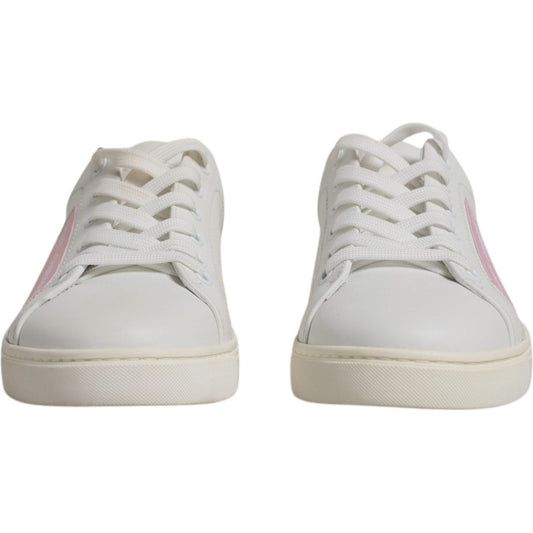 Dolce & Gabbana white calf leather sneakers with pink detail, rubber sole, lace-up closure, front view, luxury Italian footwear.