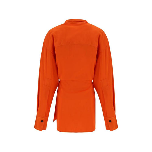 Back view of an orange Ferragamo shirt with classic collar, adjustable cuffs, kimono closure, and oversize fit.