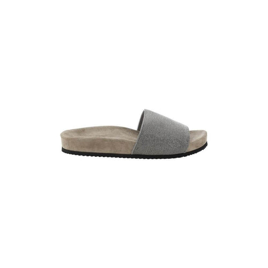 Brunello Cucinelli sandals with flat sole, round toe, wide jeweled front band, suede sole design, press-stamped logo insole.