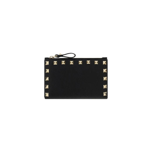 Valentino Garavani Rockstud leather card holder with gold studs, featuring zippered welt pocket and card slots.