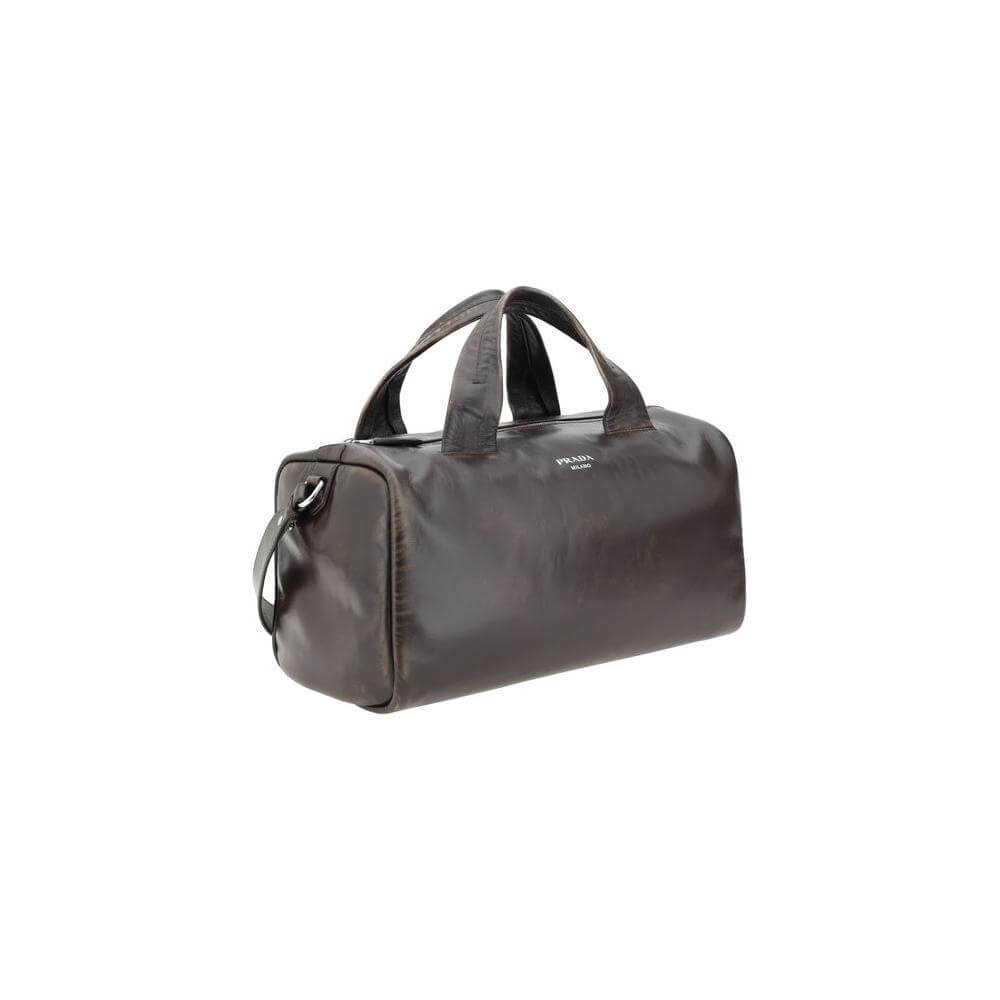 Front view with bag zipped and handles upright.