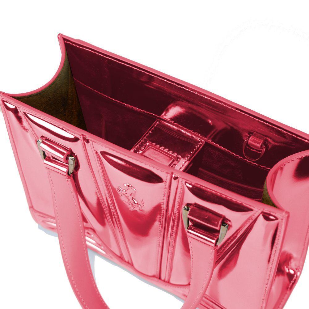 Front view with bag zipped and handles upright.