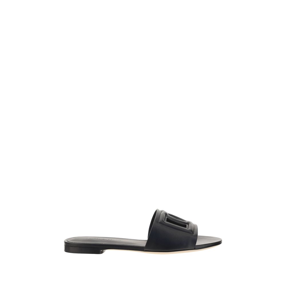 Dolce & Gabbana Millenials Sandals, leather sandals with logo-embossed front strap, rounded toe, and flat sole for comfort, AW25 season.