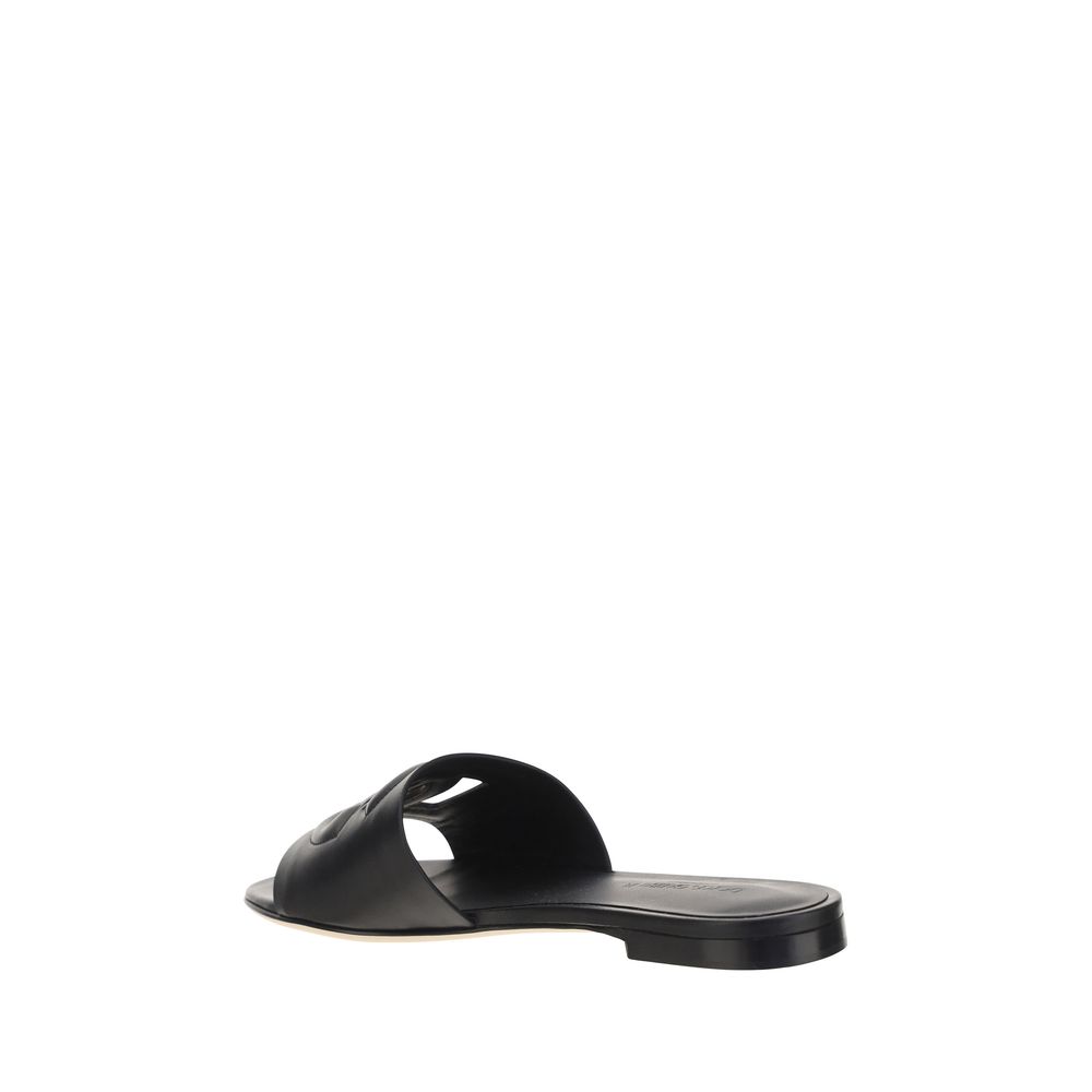 Side view of Dolce & Gabbana Millenials Sandals with embossed logo and flat sole.