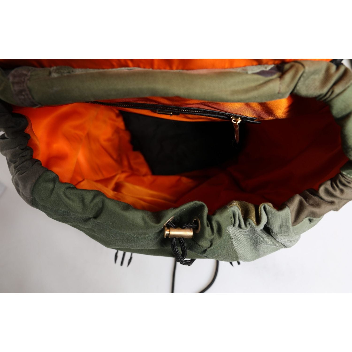 Front view with bag zipped and handles upright.