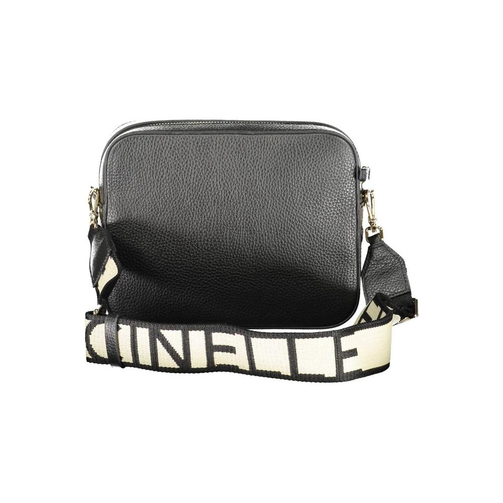Front view with bag zipped and handles upright.