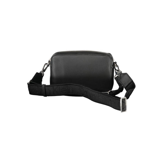 Calvin Klein black polyester women's handbag with removable shoulder handle and adjustable strap, urban chic design.