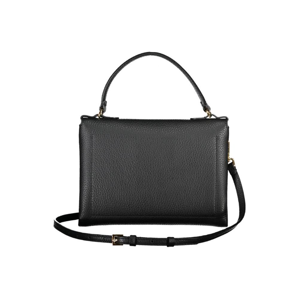 Front view with bag zipped and handles upright.