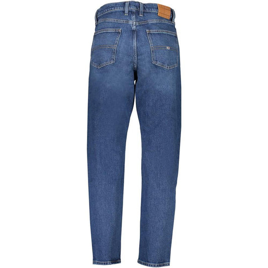 Tommy Hilfiger blue jeans, relaxed tapered fit with embroidery, five pockets, button and zip, rear view with logo patch.