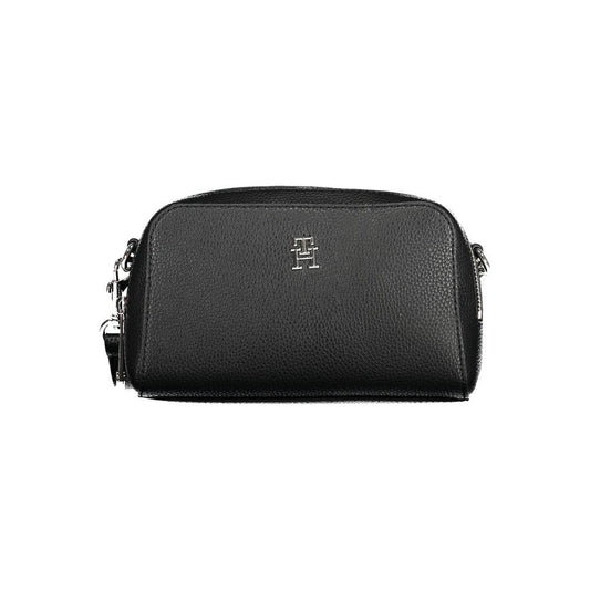 Tommy Hilfiger black polyethylene handbag with logo, adjustable and removable shoulder strap, and zip closure.