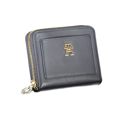 Tommy Hilfiger Blue Polyethylene Wallet with logo, zip closure, coin purse, and external pocket, ideal for cards and cash management.