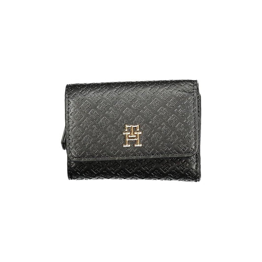 Tommy Hilfiger black polyethylene women's wallet with embossed pattern and gold logo detail, featuring secure closures.