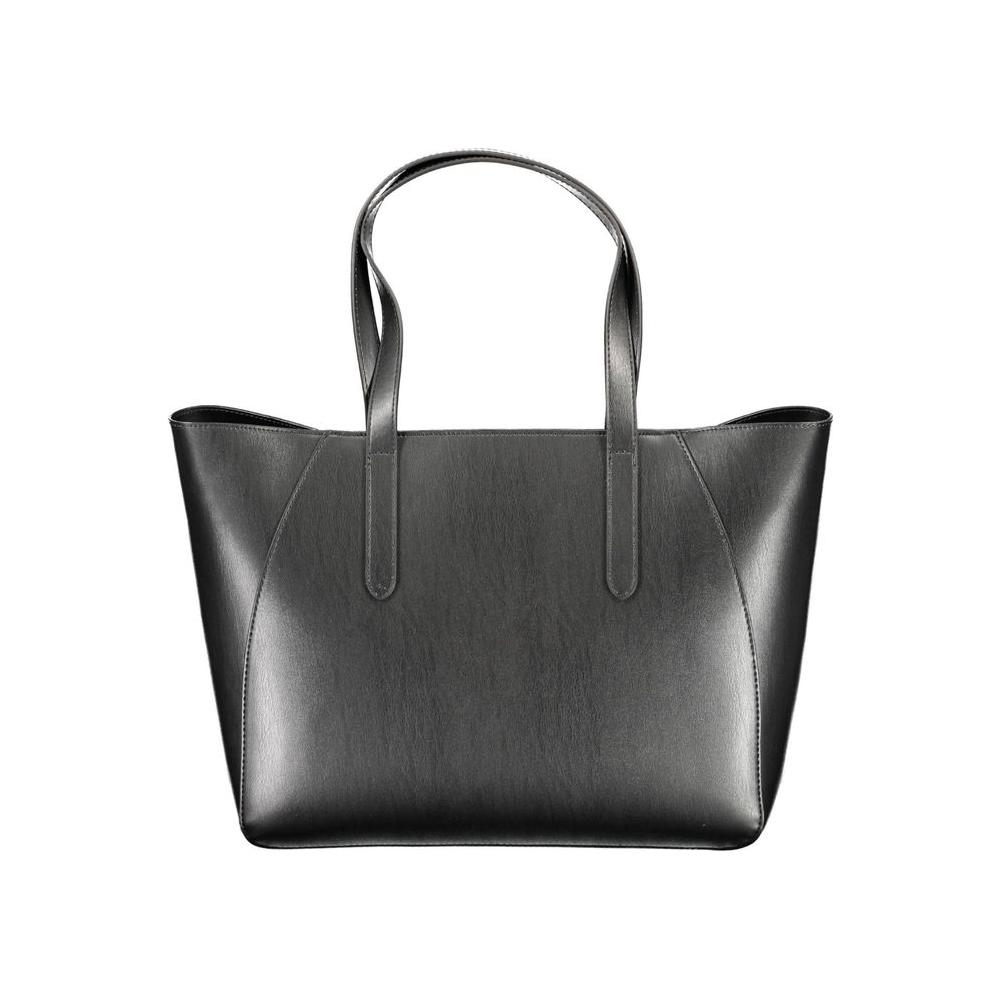 Front view with bag zipped and handles upright.