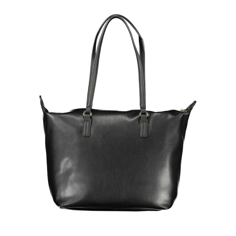Front view with bag zipped and handles upright.