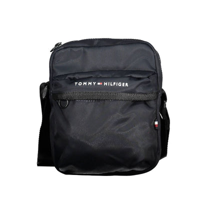 Tommy Hilfiger Blue Polyester Men Shoulder Bag with logo, external pocket, and zip closure. Eco-friendly and stylish accessory for men.