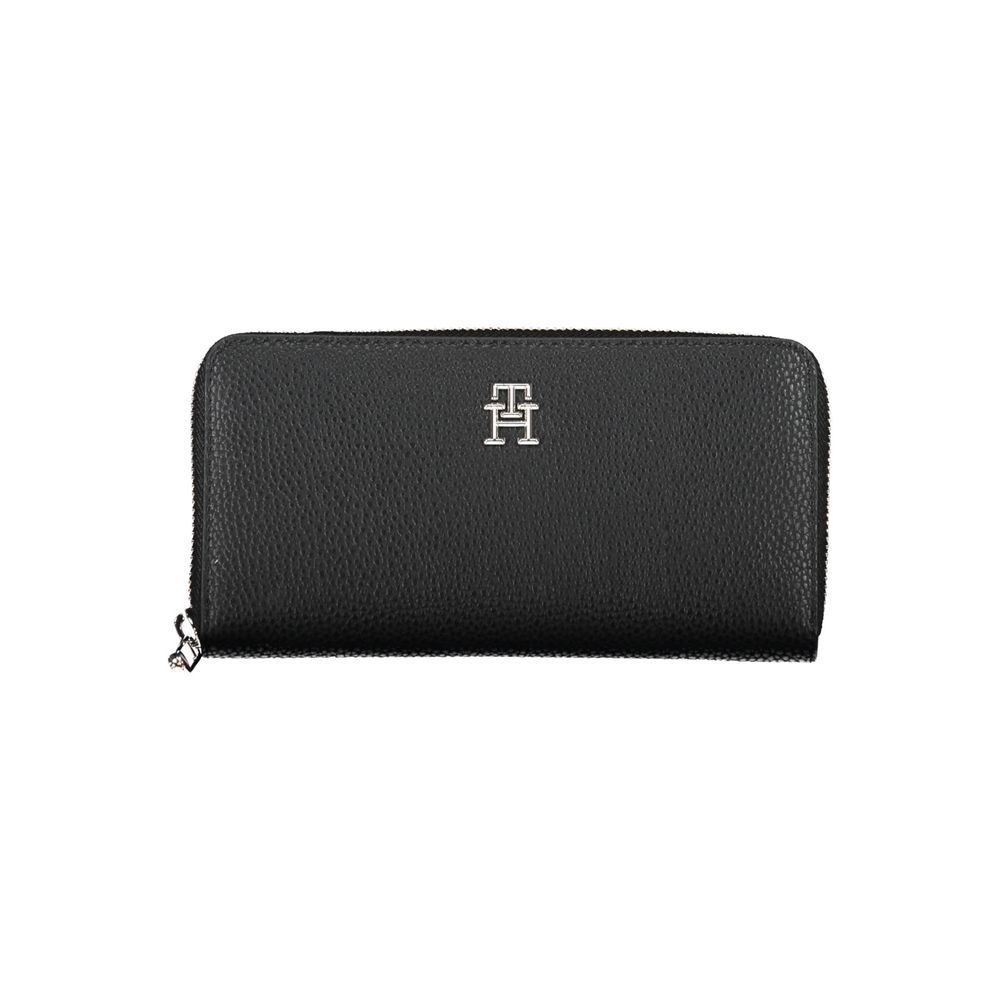 Tommy Hilfiger Black Polyethylene Women Wallet with zip closure and logo, featuring a stylish and practical design for modern trendsetters.