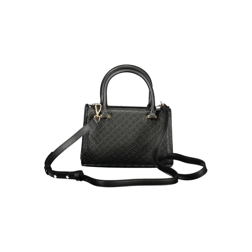 Front view with bag zipped and handles upright.
