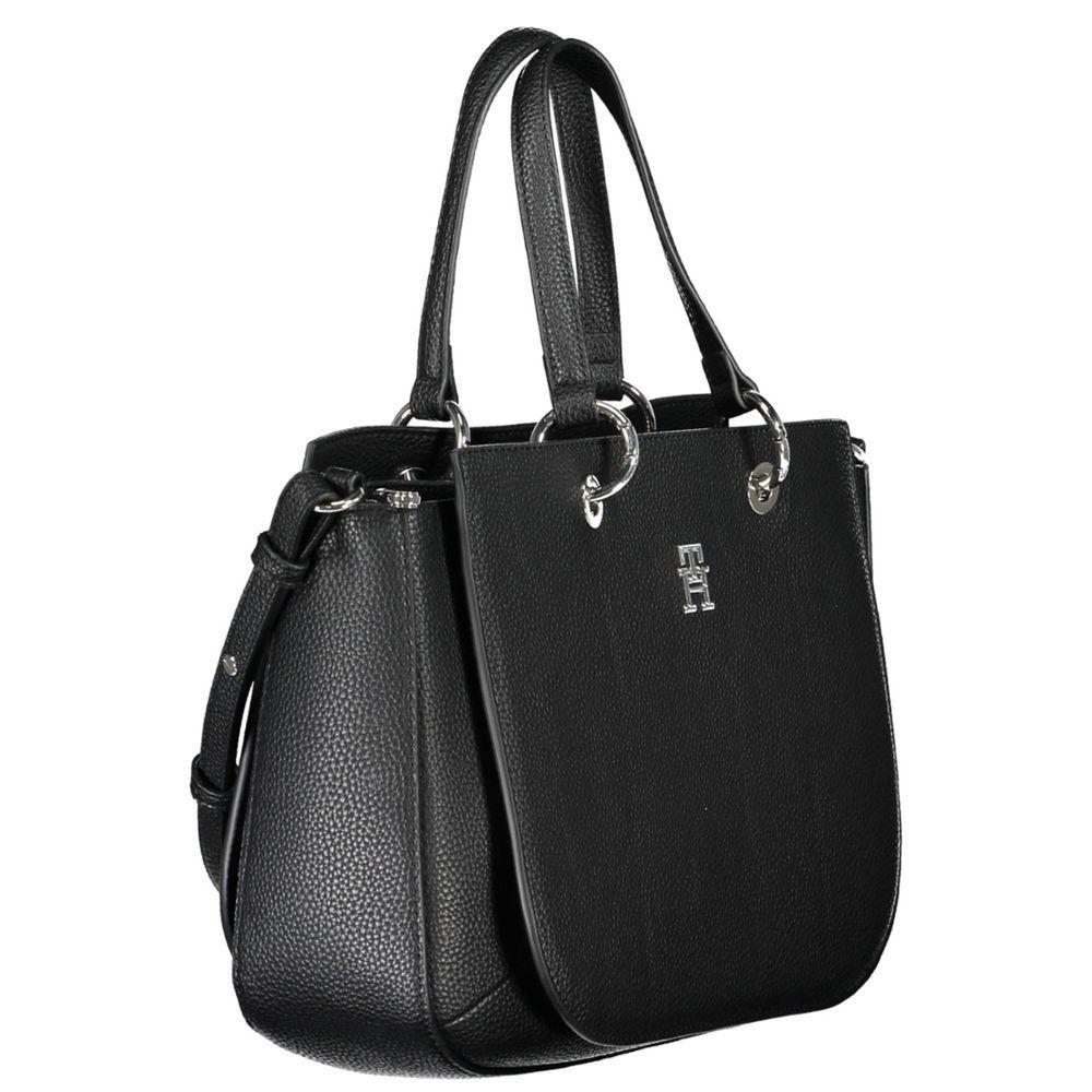 Front view with bag zipped and handles upright.