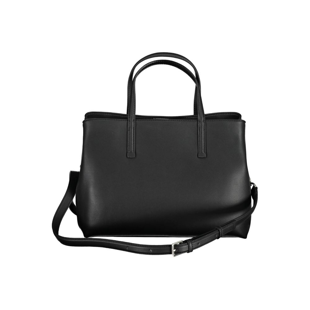 Front view with bag zipped and handles upright.