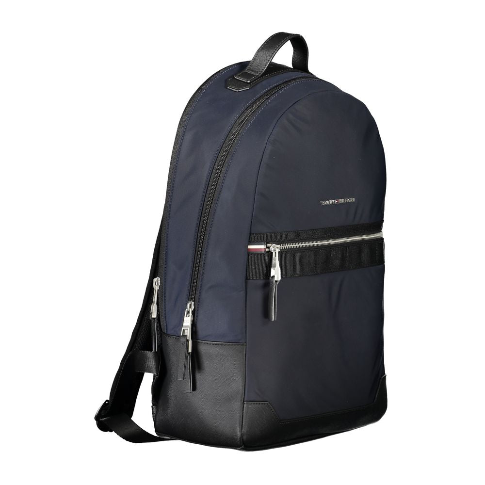 Tommy Hilfiger Blue Polyester Backpack with adjustable straps, external pocket, and zip closure, ideal for laptops, made of 50% recycled polyester.