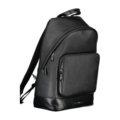 Calvin Klein Black Polyester Backpack with adjustable straps and multiple compartments, featuring a logo and contrasting details.