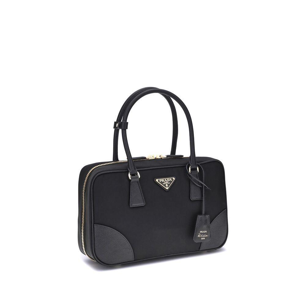 Front view with bag zipped and handles upright.