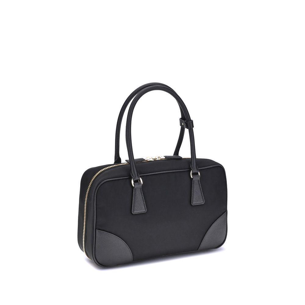 Front view with bag zipped and handles upright.