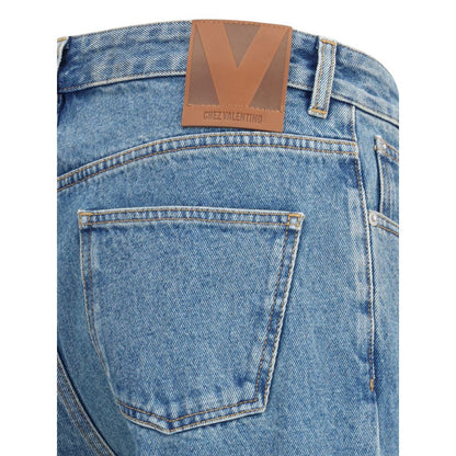 Close-up of Valentino Blue Cotton Straight-Leg Jeans with logoed leather patch highlighting classic five-pocket design.