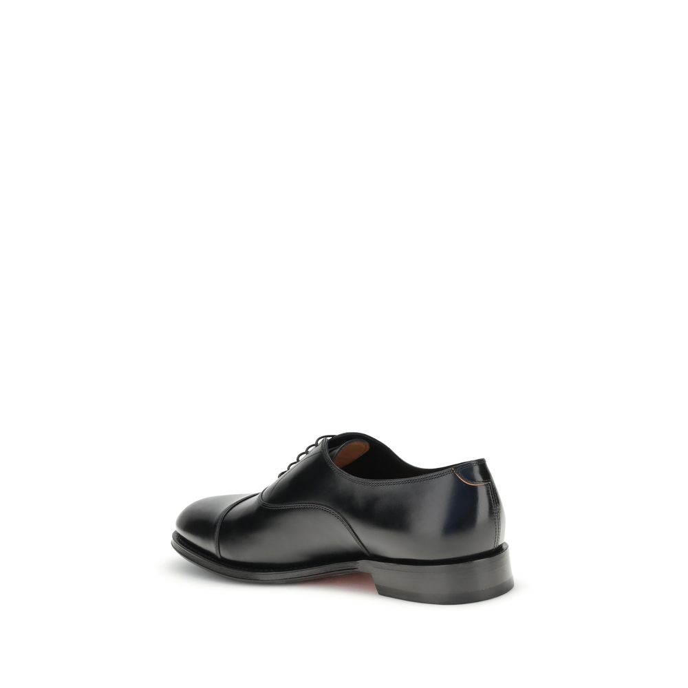 Santoni Black Calf Leather Bos Taurus Oxfords And Derbies rear view showcasing hand-antiqued leather and classic design.