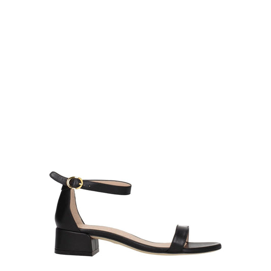 Stuart Weitzman Black Leather Flat Sandals with buckle closure and open toe, featuring a mid heel and leather sole.
