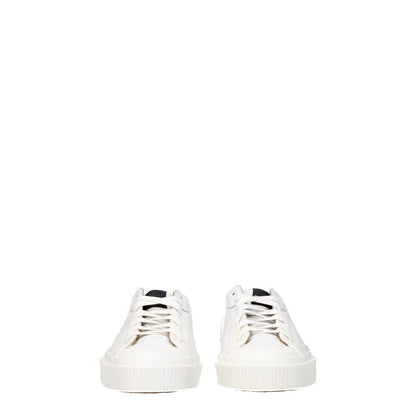 Givenchy White Leather Low Top Sneakers with front logo, lace-up closure, and rubber sole, featuring sporty glam design and round toe.