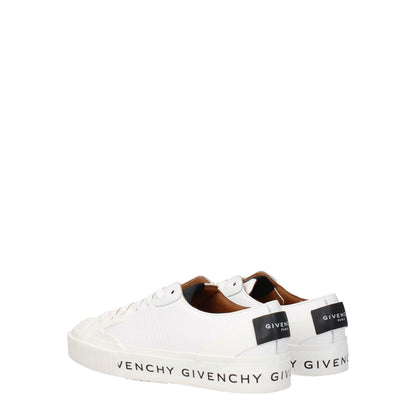Givenchy White Leather Low Top Sneakers featuring logos on front, side, and back, sporty glam design, lace-up closure, rubber sole, and flat heel.