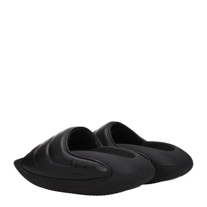 Balmain Black Leather Slippers with side logo, mid heels, open toe, rubber sole. Elegant casual footwear for men.