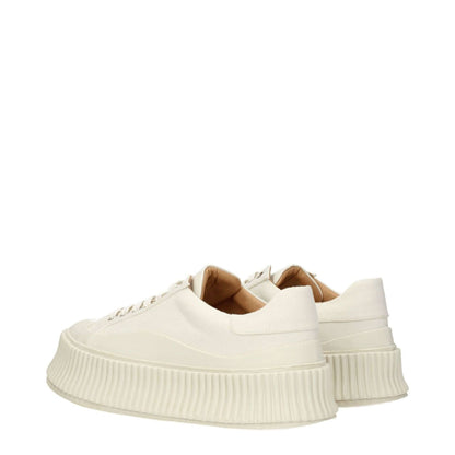 Jil Sander White Fabric Platform Sneakers with 5 cm wedge heel, lace-up closure, round toe, and rubber sole in aged effect design.
