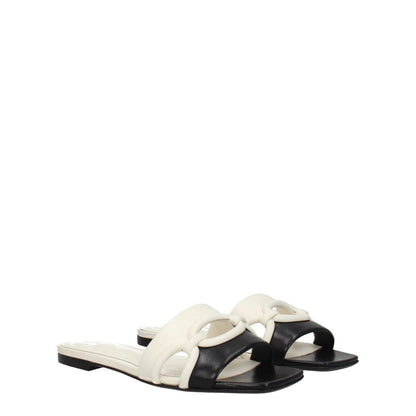 Valentino Garavani Black Leather Slippers with open toe and low flat heel, featuring ivory accents, MPN S0GH7ZUC790, casual style footwear.