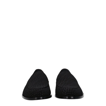 Dolce & Gabbana Black Velvet Slip-On Loafers with round toe and leather sole, featuring logo detailing.