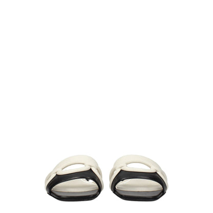 Valentino Garavani Black Leather Slippers with ivory accents, open toe, casual style. MPN: S0GH7ZUC790.