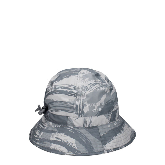 Moncler Gray Polyester Bucket Hat with front logo and drawstring closure, sporty glam style, designed with 100% polyester material.