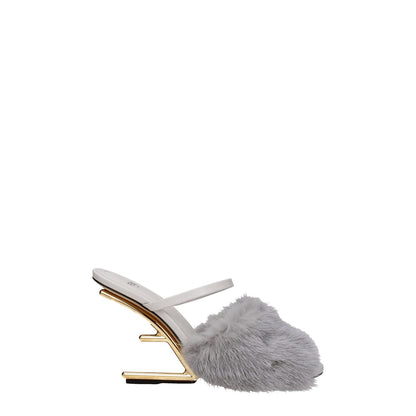 Fendi Gray Mink Slippers with high heel and open toe, featuring side logo and leather sole, light grey color, casual style.