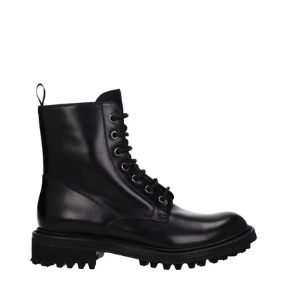 Church's Black Leather Ankle Boots with lace-up closure and vintage effect, featuring a low flat heel and rubber sole, casual style.