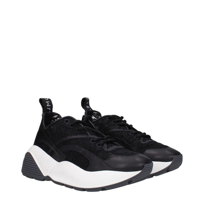 Stella McCartney Black Fabric Chunky Sneakers with lace-up closure, rubber sole, and mid heel, featuring a round toe and back logo.