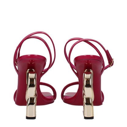 Dolce & Gabbana Pink Leather Stiletto Heel Sandals with gold details, open toe, and high heel design.