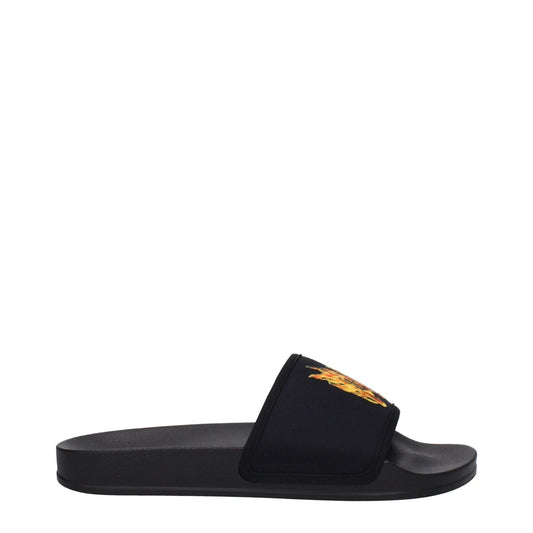 Palm Angels Black Fabric Slippers with frontal logo, open toe design, and rubber sole, side view featured.