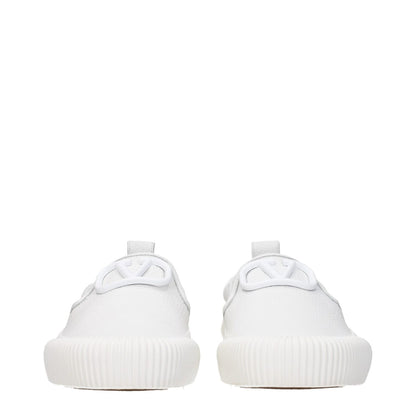 Valentino Garavani White Leather Slip-On Loafers with rubber sole, front and back logo, round toe, low flat heel, casual style shoe.