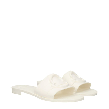 Moncler White Cotton Slippers with rubber sole and open toe design, featuring front logo. Stylish footwear perfect for casual comfort.