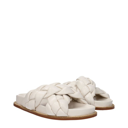 Fabiana Filippi Beige Leather Slippers with open toe, casual style, and low flat heel, featuring a rubber sole, in beige and ivory.