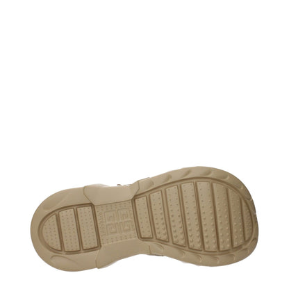 Sole view of Givenchy Brown Leather Slippers showcasing the rubber outsole with logo print for casual style.