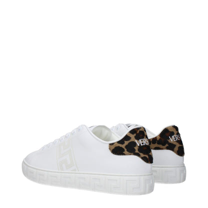 Versace White Leather Low Top Sneakers with animal print detail and logo, featuring lace-up closure, rubber sole, and round toe.