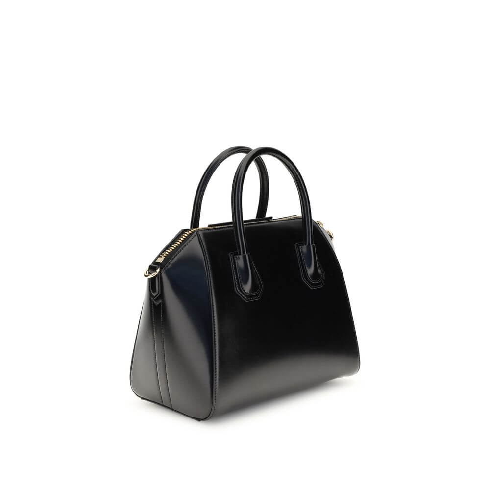 Givenchy Black Calf Leather Bos Taurus Handbag with elegant design and gold accents.
